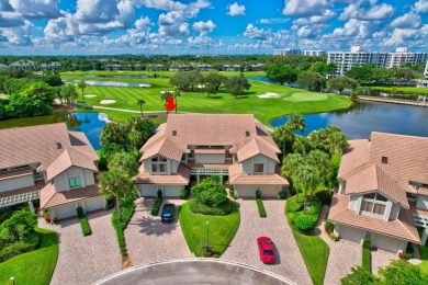 Charter Cay 2nd floor club villa with magnificent water and golf on Boca West Golf and Country Club in Florida - for sale on GolfHomes.com, golf home, golf lot