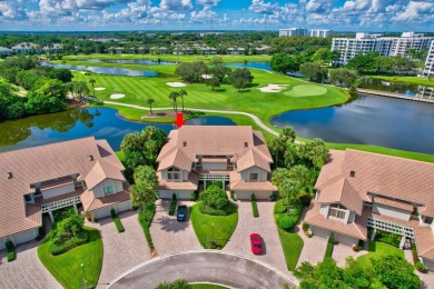 Charter Cay 2nd floor club villa with magnificent water and golf on Boca West Golf and Country Club in Florida - for sale on GolfHomes.com, golf home, golf lot