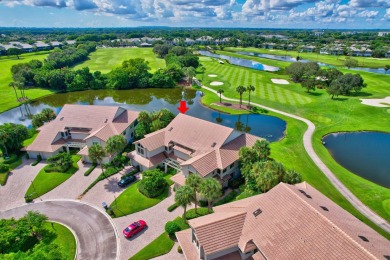 Charter Cay 2nd floor club villa with magnificent water and golf on Boca West Golf and Country Club in Florida - for sale on GolfHomes.com, golf home, golf lot