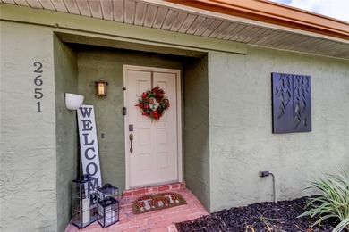 Corner-Lot Pool Home in Clubhouse Estates of Countryside ...
 on Countryside Country Club in Florida - for sale on GolfHomes.com, golf home, golf lot