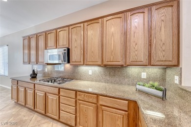 Immaculate single story in top rated 55+ community. This on Revere Golf Club in Nevada - for sale on GolfHomes.com, golf home, golf lot
