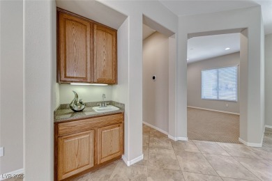 Immaculate single story in top rated 55+ community. This on Revere Golf Club in Nevada - for sale on GolfHomes.com, golf home, golf lot