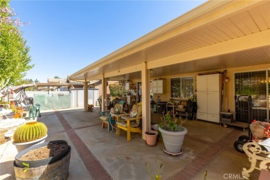 Located in the gated 55+ community of Sun Lakes Country Club on Sun Lakes Country Club in California - for sale on GolfHomes.com, golf home, golf lot