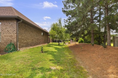 Lake Caroline beauty!!Beautifully maintained 3BR/2BA home with on Lake Caroline Golf Club in Mississippi - for sale on GolfHomes.com, golf home, golf lot