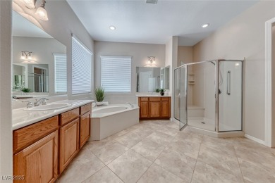 Immaculate single story in top rated 55+ community. This on Revere Golf Club in Nevada - for sale on GolfHomes.com, golf home, golf lot