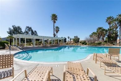 Located in the gated 55+ community of Sun Lakes Country Club on Sun Lakes Country Club in California - for sale on GolfHomes.com, golf home, golf lot