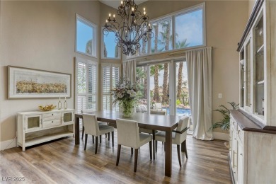 Floor-to-ceiling windows frame the lush greens of the 7th hole on Canyon Gate Country Club in Nevada - for sale on GolfHomes.com, golf home, golf lot