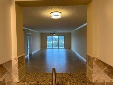 This beautiful Penthouse unit overlooking the green on the 2nd on Atlantis Golf Club in Florida - for sale on GolfHomes.com, golf home, golf lot