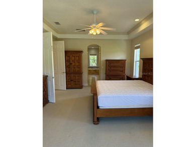 Rarely used 5 Bed/4 Bath POOL Home in GATED Community with GOLF on Kissimmee Bay Country Club in Florida - for sale on GolfHomes.com, golf home, golf lot