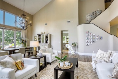 Floor-to-ceiling windows frame the lush greens of the 7th hole on Canyon Gate Country Club in Nevada - for sale on GolfHomes.com, golf home, golf lot