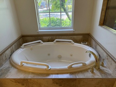 Rarely used 5 Bed/4 Bath POOL Home in GATED Community with GOLF on Kissimmee Bay Country Club in Florida - for sale on GolfHomes.com, golf home, golf lot