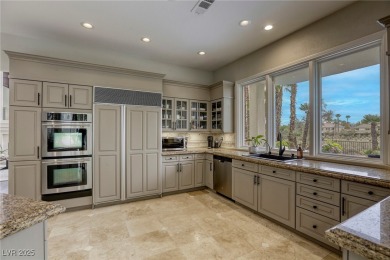 Floor-to-ceiling windows frame the lush greens of the 7th hole on Canyon Gate Country Club in Nevada - for sale on GolfHomes.com, golf home, golf lot