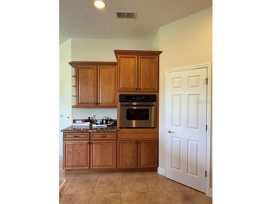 Rarely used 5 Bed/4 Bath POOL Home in GATED Community with GOLF on Kissimmee Bay Country Club in Florida - for sale on GolfHomes.com, golf home, golf lot