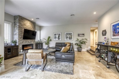 Floor-to-ceiling windows frame the lush greens of the 7th hole on Canyon Gate Country Club in Nevada - for sale on GolfHomes.com, golf home, golf lot