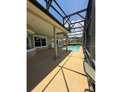 Rarely used 5 Bed/4 Bath POOL Home in GATED Community with GOLF on Kissimmee Bay Country Club in Florida - for sale on GolfHomes.com, golf home, golf lot