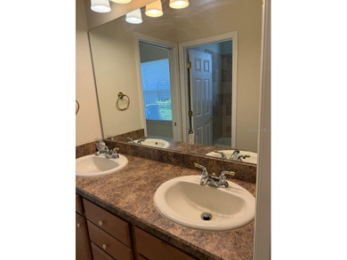 Rarely used 5 Bed/4 Bath POOL Home in GATED Community with GOLF on Kissimmee Bay Country Club in Florida - for sale on GolfHomes.com, golf home, golf lot