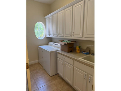 Rarely used 5 Bed/4 Bath POOL Home in GATED Community with GOLF on Kissimmee Bay Country Club in Florida - for sale on GolfHomes.com, golf home, golf lot