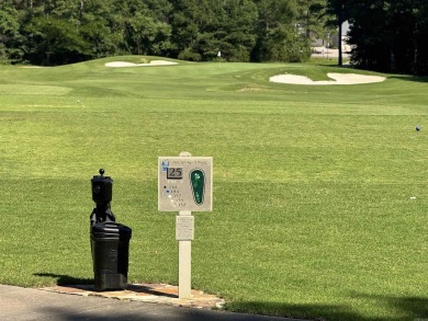 Situated overlooking one of Isabella Golf Course's scenic par 3s on Isabella Golf Course  in Arkansas - for sale on GolfHomes.com, golf home, golf lot
