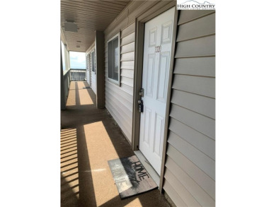 Beautifully updated turnkey unit with luxury vinal plank floors on Beech Mountain Club in North Carolina - for sale on GolfHomes.com, golf home, golf lot