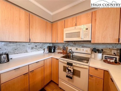 Beautifully updated turnkey unit with luxury vinal plank floors on Beech Mountain Club in North Carolina - for sale on GolfHomes.com, golf home, golf lot