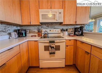 Beautifully updated turnkey unit with luxury vinal plank floors on Beech Mountain Club in North Carolina - for sale on GolfHomes.com, golf home, golf lot