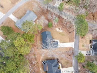 Built in 2024 and thoughtfully enhanced beyond the builder's on Carolina Trace Country Club in North Carolina - for sale on GolfHomes.com, golf home, golf lot