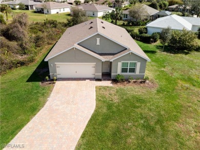 Welcome to this beautifully maintained 4-bedroom, 2-bathroom on Kingsway Country Club in Florida - for sale on GolfHomes.com, golf home, golf lot