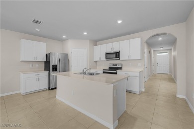 Welcome to this beautifully maintained 4-bedroom, 2-bathroom on Kingsway Country Club in Florida - for sale on GolfHomes.com, golf home, golf lot