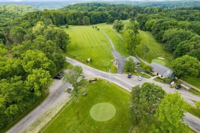 Don't miss out on this stunning seasonal lake views that this on Hide-A-Way Hills Golf Club in Ohio - for sale on GolfHomes.com, golf home, golf lot