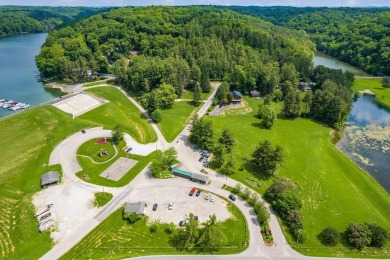 Don't miss out on this stunning seasonal lake views that this on Hide-A-Way Hills Golf Club in Ohio - for sale on GolfHomes.com, golf home, golf lot