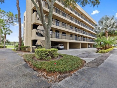 Discover the epitome of condominium living in this bright and on Tarpon Springs Golf Course in Florida - for sale on GolfHomes.com, golf home, golf lot