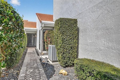 Rarely available two-bedroom, two-bath villa in the Peppertree on Boca West Golf and Country Club in Florida - for sale on GolfHomes.com, golf home, golf lot