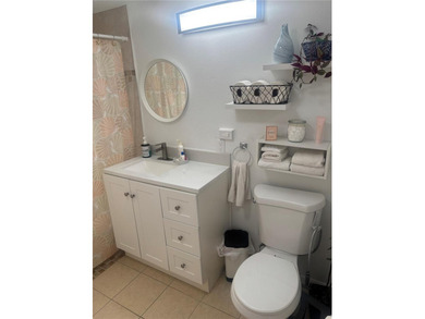 Welcome to this charming waterfront-view 2-bedroom, 2-bath on Beacon Woods Golf Club in Florida - for sale on GolfHomes.com, golf home, golf lot