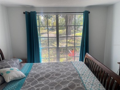 Welcome to this charming waterfront-view 2-bedroom, 2-bath on Beacon Woods Golf Club in Florida - for sale on GolfHomes.com, golf home, golf lot