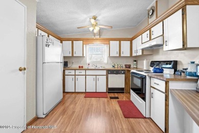 Welcome home to this very unique two bedroom, two bathroom home on Brookridge Country Club in Florida - for sale on GolfHomes.com, golf home, golf lot