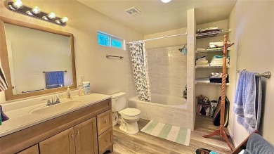 Experience relaxed lake living in this inviting 2-bedroom on Links At Lands End in Texas - for sale on GolfHomes.com, golf home, golf lot