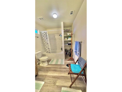 Experience relaxed lake living in this inviting 2-bedroom on Links At Lands End in Texas - for sale on GolfHomes.com, golf home, golf lot