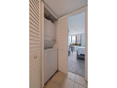An abundance of natural light and updates in this welcoming on Isla Del Sol Yacht and Country Club in Florida - for sale on GolfHomes.com, golf home, golf lot