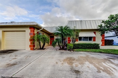 WELCOME HOME to this beautifully updated Open and Spacious villa on Seminole Lake Country Club in Florida - for sale on GolfHomes.com, golf home, golf lot