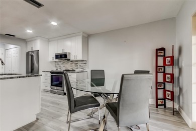 WELCOME HOME to this beautifully updated Open and Spacious villa on Seminole Lake Country Club in Florida - for sale on GolfHomes.com, golf home, golf lot