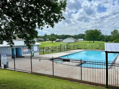 Experience relaxed lake living in this inviting 2-bedroom on Links At Lands End in Texas - for sale on GolfHomes.com, golf home, golf lot