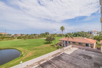 An abundance of natural light and updates in this welcoming on Isla Del Sol Yacht and Country Club in Florida - for sale on GolfHomes.com, golf home, golf lot