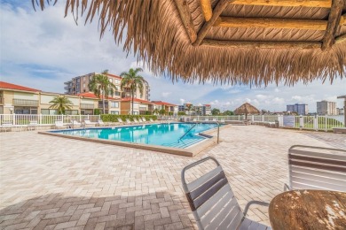 An abundance of natural light and updates in this welcoming on Isla Del Sol Yacht and Country Club in Florida - for sale on GolfHomes.com, golf home, golf lot