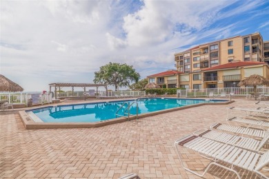 An abundance of natural light and updates in this welcoming on Isla Del Sol Yacht and Country Club in Florida - for sale on GolfHomes.com, golf home, golf lot