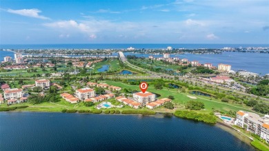 An abundance of natural light and updates in this welcoming on Isla Del Sol Yacht and Country Club in Florida - for sale on GolfHomes.com, golf home, golf lot