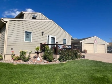 This well-maintained lake home has been totally remodeled with on Bayside Golf Course in Nebraska - for sale on GolfHomes.com, golf home, golf lot