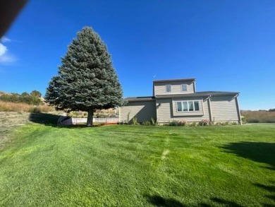 This well-maintained lake home has been totally remodeled with on Bayside Golf Course in Nebraska - for sale on GolfHomes.com, golf home, golf lot