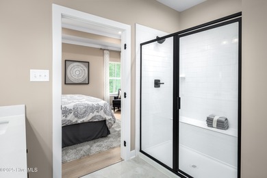 Welcome to Resort Style Living a golf cart ride to Sunset Beach on Sea Trail Golf Resort in North Carolina - for sale on GolfHomes.com, golf home, golf lot