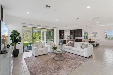 Welcome to luxurious living in the guard-gated Eagle Creek on Eagle Creek Golf Club in Florida - for sale on GolfHomes.com, golf home, golf lot