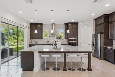 Welcome to luxurious living in the guard-gated Eagle Creek on Eagle Creek Golf Club in Florida - for sale on GolfHomes.com, golf home, golf lot